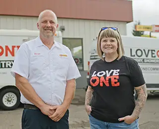 Les Schwab manager with LoveOne's Executive Director