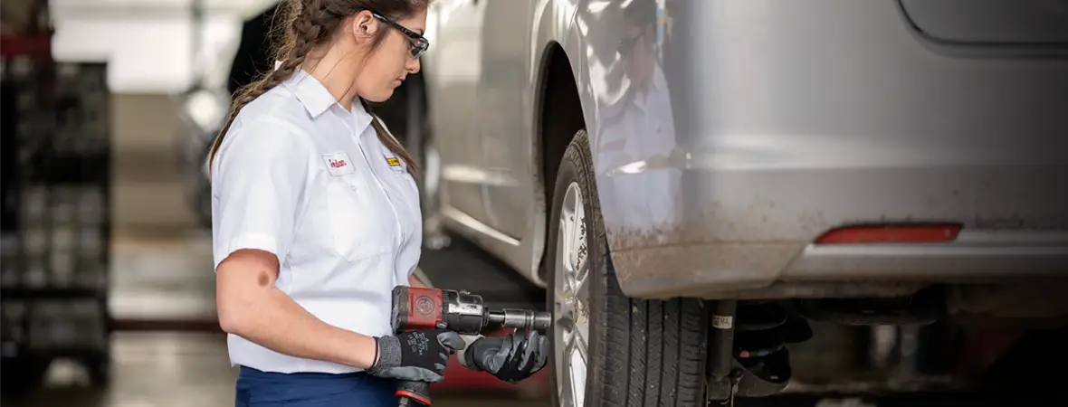 Tire technician installing tirest