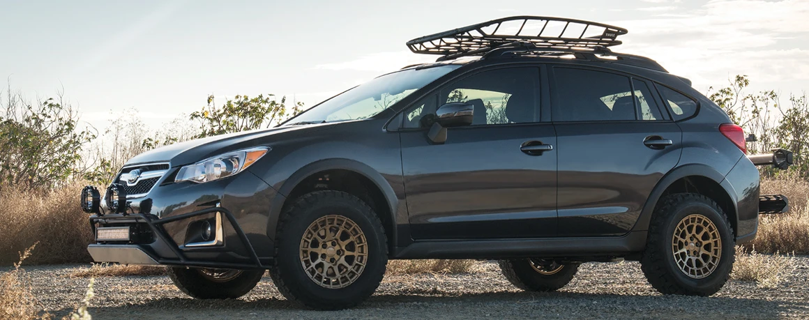 A raised crossover vehicle is ready for an offroad adventure