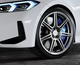 White car with Raceline wheels