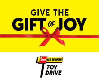 Yellow Les Schwab Toy Drive Banner