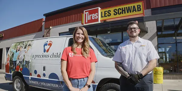 Les Schwab manager with A Precious Child's Chief Communications Officer
