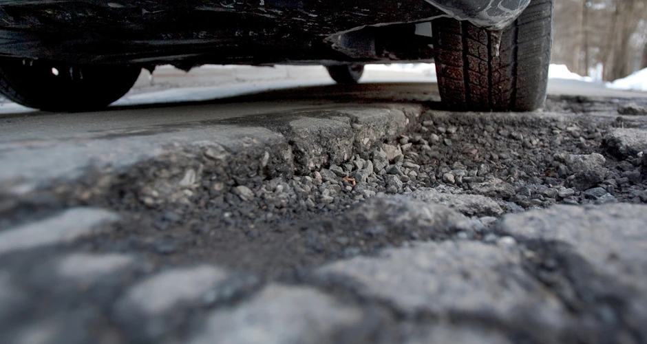 Close-up of a tire on a rough road height=