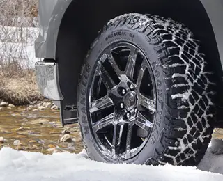 Silver pickup in the snow