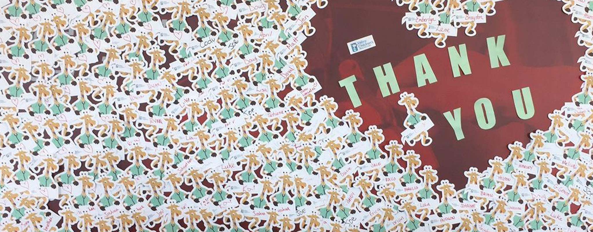 A Thank You poster at Valley Children’s Hospital covered in lots of doctor giraffe stickers.